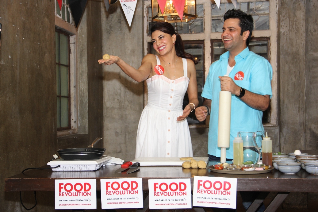 Champions of Food Revolution Day - Jacqueline Fernandez and Chef Kunal Kapur during the cook up session