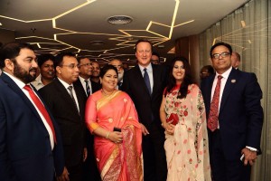 David Cameron with Enam Ali and guests