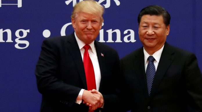 Stocks and oil surge as Trump calls truce in China trade war